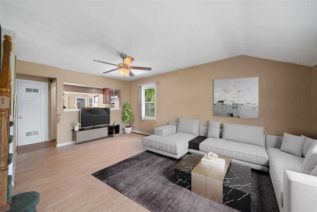 96 Pardee Ave, Islip, NY 11751 - living room with ceiling fan, wood finished floors, baseboard heating, vaulted ceiling, and baseboards
