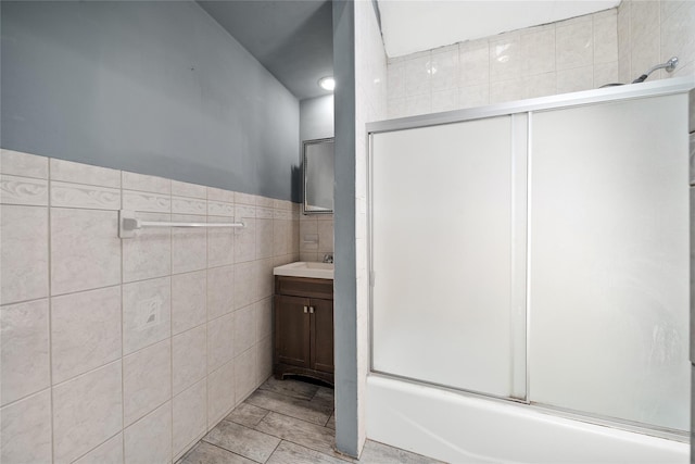 96 Pardee Ave, Islip, NY 11751 - full bath with tile walls, vanity, and shower / bath combination with glass door