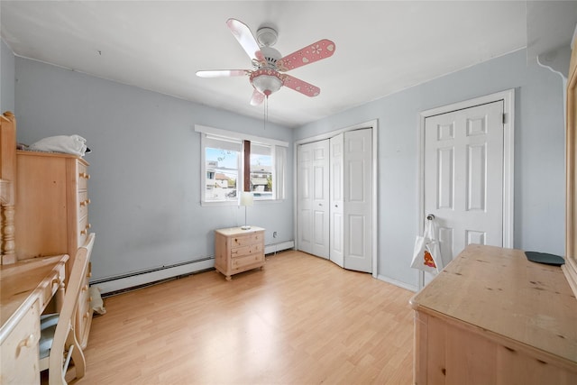 96 Pardee Ave, Islip, NY 11751 - bedroom featuring a baseboard radiator, light wood finished floors, and a ceiling fan
