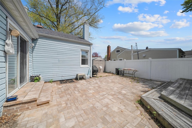 96 Pardee Ave, Islip, NY 11751 - view of patio / terrace with a shed, fence, and an outbuilding