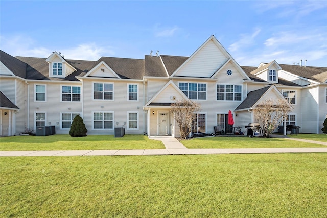multi unit property with cooling unit and a front yard