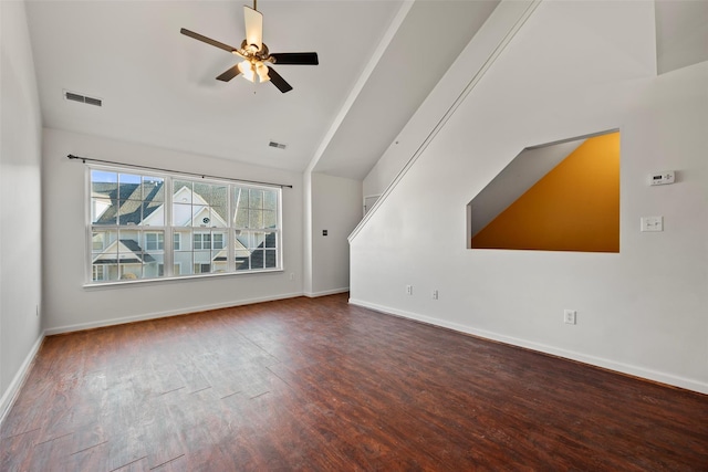 unfurnished living room featuring visible vents, wood finished floors, baseboards, ceiling fan, and vaulted ceiling