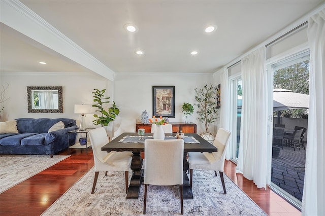 86 Jefferson Ave, Island Park, NY 11558 - dining room featuring crown molding, recessed lighting, and wood finished floors