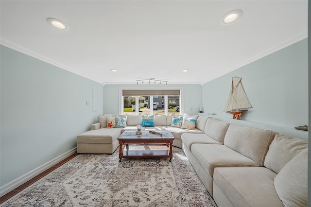 86 Jefferson Ave, Island Park, NY 11558 - living room featuring crown molding, baseboards, and wood finished floors