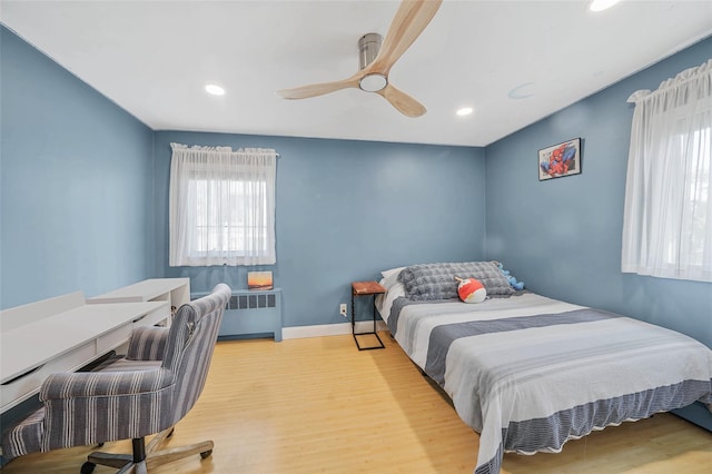 86 Jefferson Ave, Island Park, NY 11558 - bedroom featuring recessed lighting, a ceiling fan, wood finished floors, and radiator