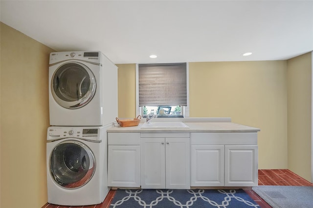 86 Jefferson Ave, Island Park, NY 11558 - laundry room featuring cabinet space, stacked washer / drying machine, a sink, recessed lighting, and wood finished floors