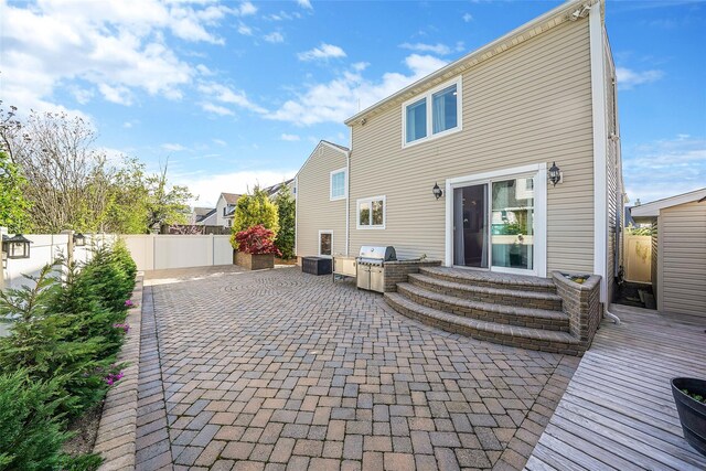 86 Jefferson Ave, Island Park, NY 11558 - back of house with a patio, fence, and entry steps