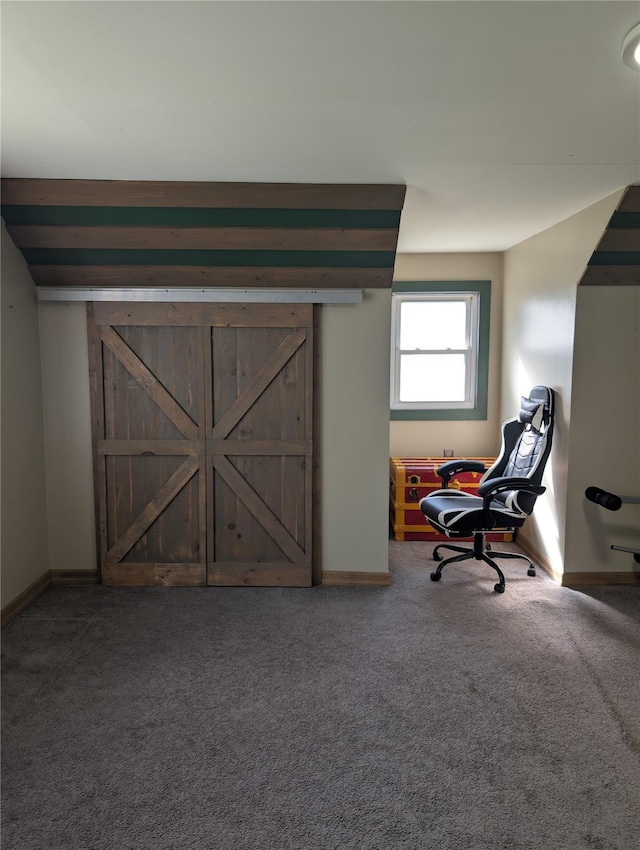 carpeted bedroom featuring baseboards