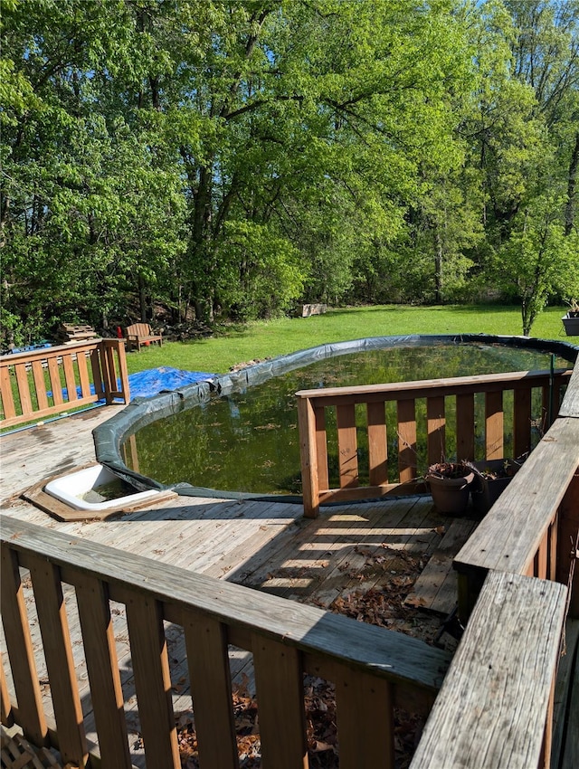 dock with a yard and a wooden deck