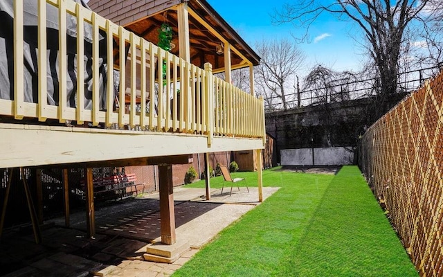 view of yard featuring a patio and a fenced backyard