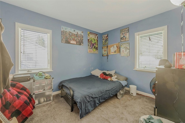 203 N Coleman Rd, Centereach, NY 11720 - bedroom with carpet floors and baseboards