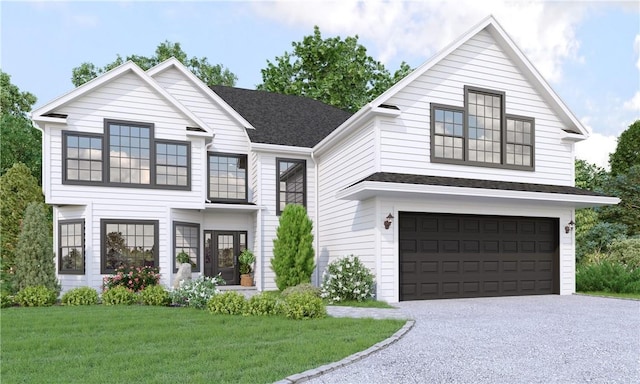 view of front of house with driveway, a front lawn, and a garage