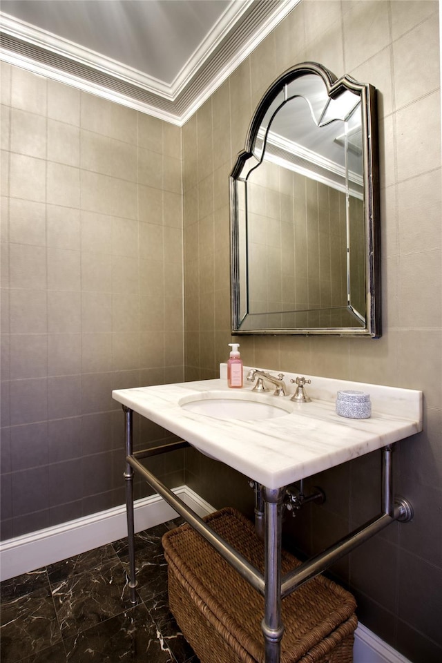 52 Northwoods Rd, Manhasset, NY 11030 - bathroom with ornamental molding, marble tiled flooring, and tile walls