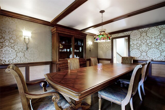 52 Northwoods Rd, Manhasset, NY 11030 - dining area featuring wallpapered walls, wainscoting, crown molding, and wood finished floors