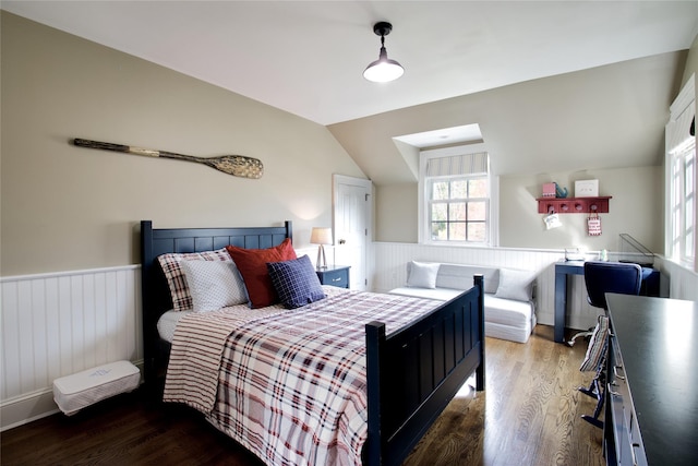 52 Northwoods Rd, Manhasset, NY 11030 - bedroom with vaulted ceiling, wainscoting, and wood finished floors