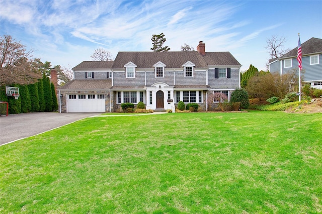 52 Northwoods Rd, Manhasset, NY 11030 - shingle-style home with asphalt driveway, a front lawn, a chimney, and stone siding