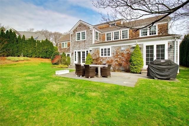 52 Northwoods Rd, Manhasset, NY 11030 - back of property with entry steps, a patio, a yard, and french doors