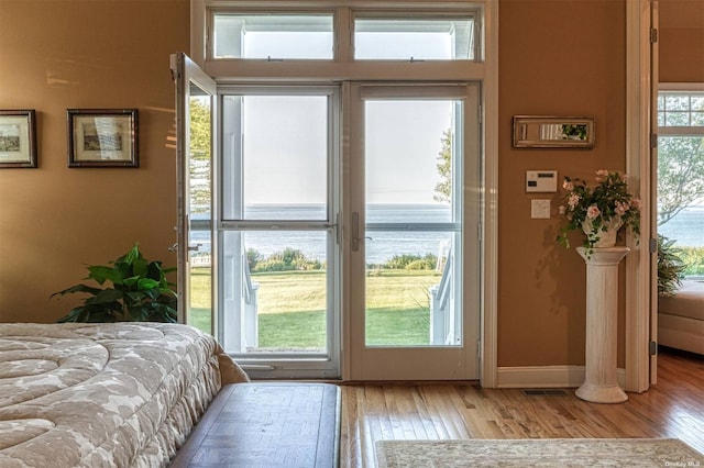 1640 Grandview Dr, Orient, NY 11957 - bedroom featuring access to outside, light wood-type flooring, and baseboards