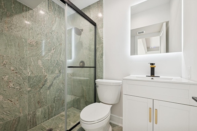 full bathroom featuring visible vents, a stall shower, vanity, baseboards, and toilet
