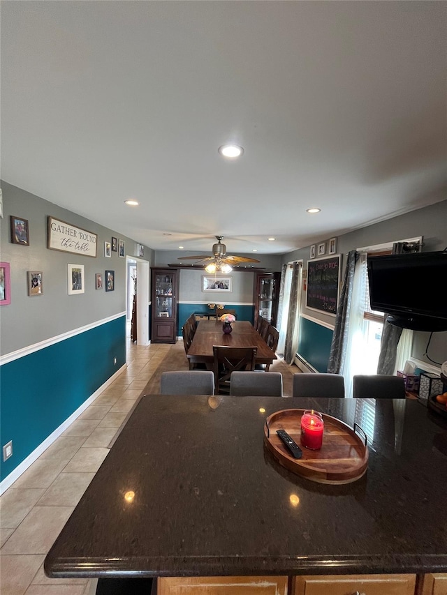 interior space featuring light tile patterned floors, ceiling fan, and recessed lighting