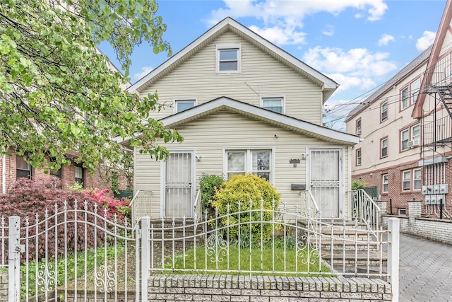 view of front of property with a fenced front yard