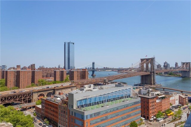 property's view of city with a water view