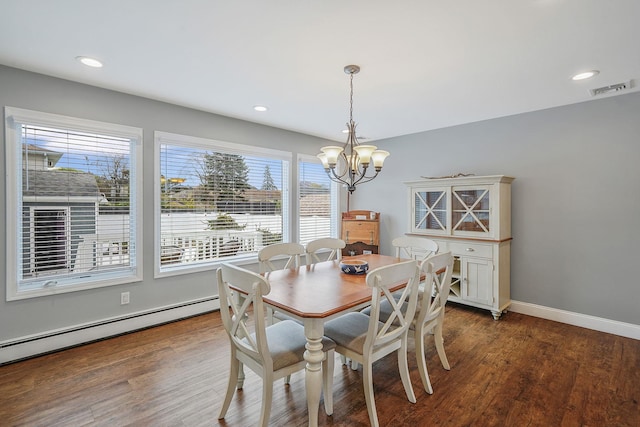 7 Grandview Dr, Shirley, NY 11967 - dining area with a wealth of natural light, visible vents, baseboard heating, and a chandelier