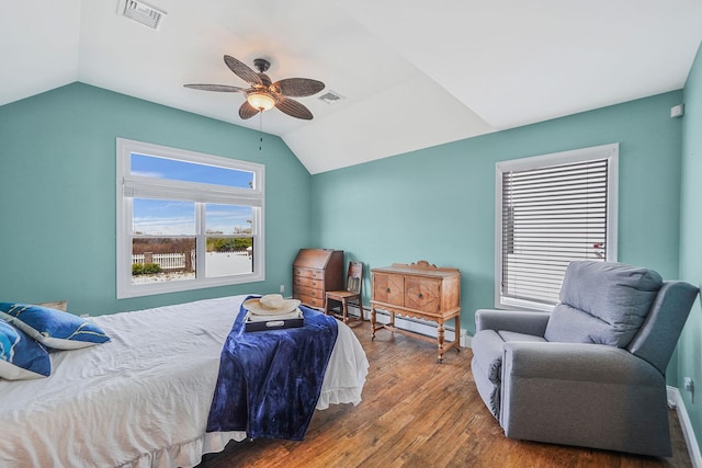 7 Grandview Dr, Shirley, NY 11967 - bedroom featuring a ceiling fan, visible vents, wood finished floors, and vaulted ceiling