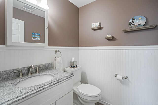 7 Grandview Dr, Shirley, NY 11967 - half bath featuring visible vents, a wainscoted wall, toilet, and vanity