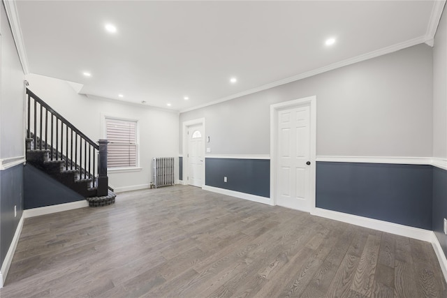 186-09 Dormans Rd, Saint Albans, NY 11412 - basement featuring wood finished floors, stairway, baseboards, ornamental molding, and recessed lighting