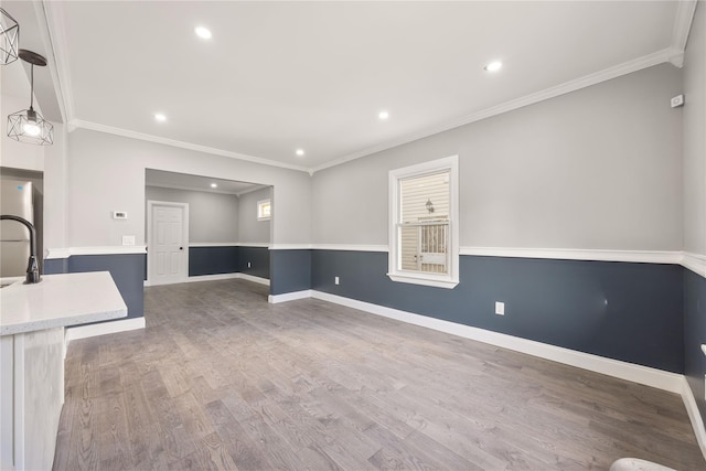 186-09 Dormans Rd, Saint Albans, NY 11412 - interior space featuring recessed lighting, crown molding, and wood finished floors