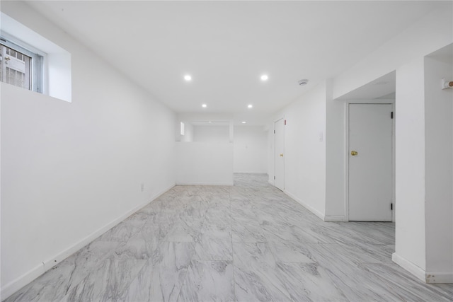 186-09 Dormans Rd, Saint Albans, NY 11412 - unfurnished room featuring baseboards, recessed lighting, and marble finish floor