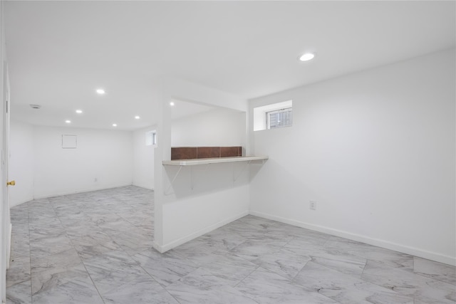 186-09 Dormans Rd, Saint Albans, NY 11412 - below grade area with baseboards, recessed lighting, and marble finish floor