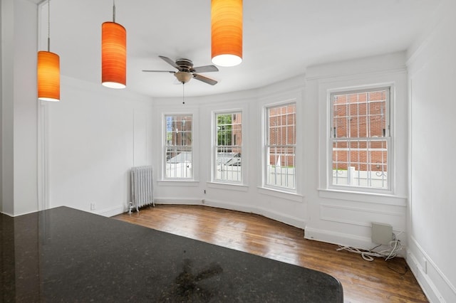 31-50 Buell, East Elmhurst, NY 11369 - unfurnished sunroom featuring radiator and plenty of natural light