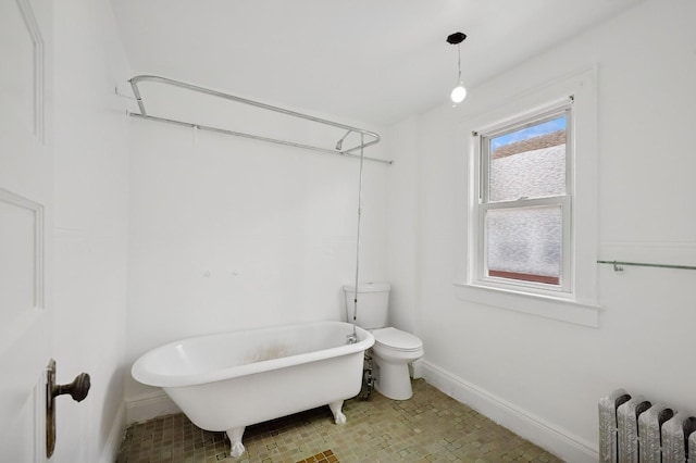 31-50 Buell, East Elmhurst, NY 11369 - full bath with baseboards, a freestanding tub, radiator, and toilet