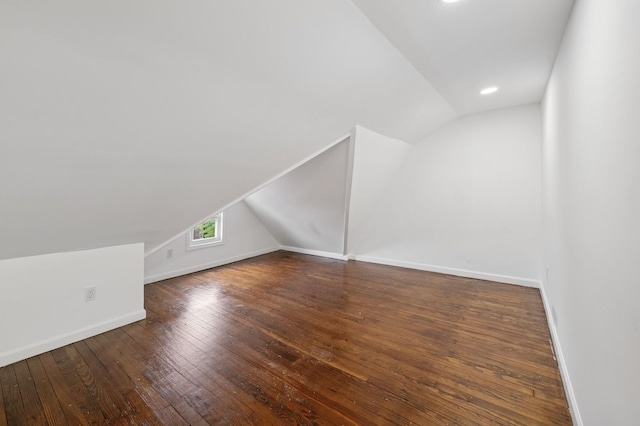 31-50 Buell, East Elmhurst, NY 11369 - additional living space with lofted ceiling, baseboards, and wood-type flooring