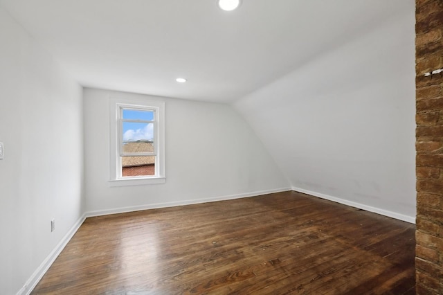 31-50 Buell, East Elmhurst, NY 11369 - additional living space featuring dark wood-style floors, lofted ceiling, baseboards, and recessed lighting