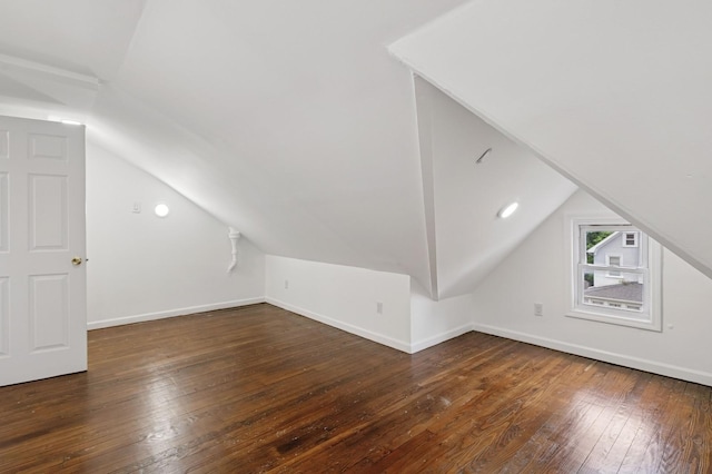 31-50 Buell, East Elmhurst, NY 11369 - additional living space with lofted ceiling, hardwood / wood-style flooring, and baseboards