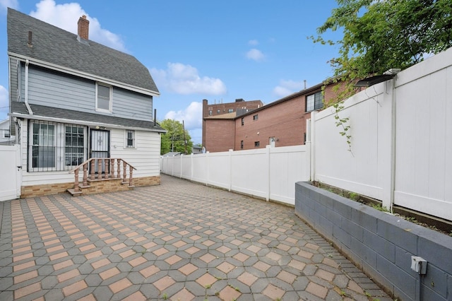 31-50 Buell, East Elmhurst, NY 11369 - view of patio featuring a fenced backyard