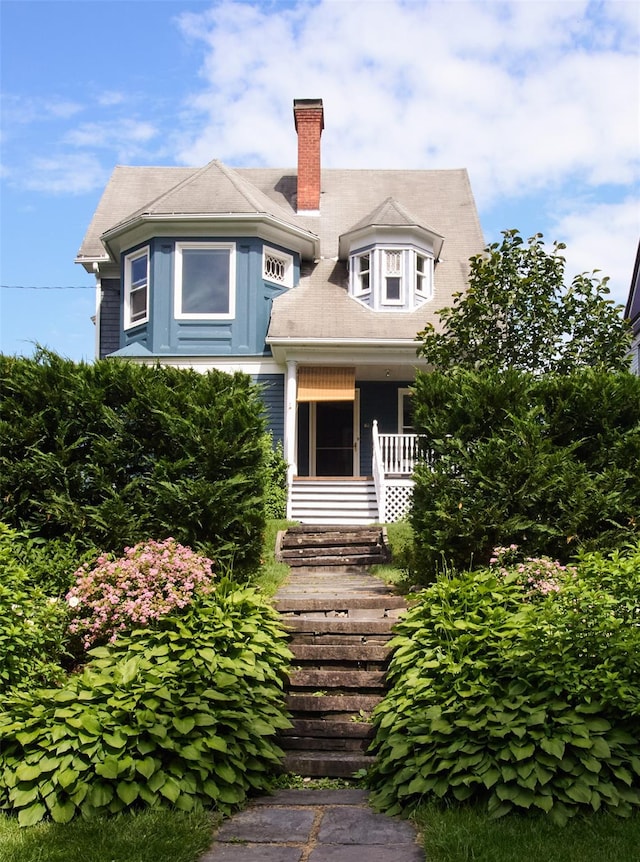 80 Clifton Ave, Kingston, NY 12401 - victorian home with a chimney and covered porch