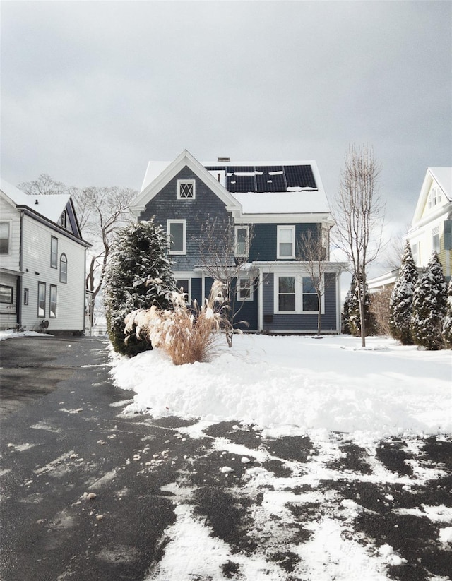 80 Clifton Ave, Kingston, NY 12401 - snow covered property with roof mounted solar panels