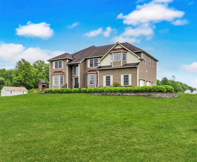 54 Fox Hill Run, Rock Tavern, NY 12575 - view of front of home featuring a garage and a front yard