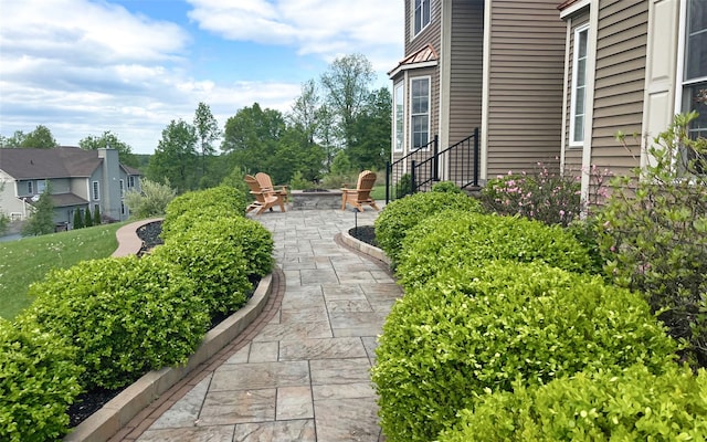 54 Fox Hill Run, Rock Tavern, NY 12575 - view of property's community featuring an outdoor fire pit and a patio area