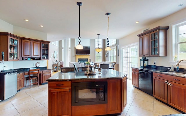 54 Fox Hill Run, Rock Tavern, NY 12575 - kitchen featuring black appliances, a sink, healthy amount of natural light, light tile patterned floors, and recessed lighting