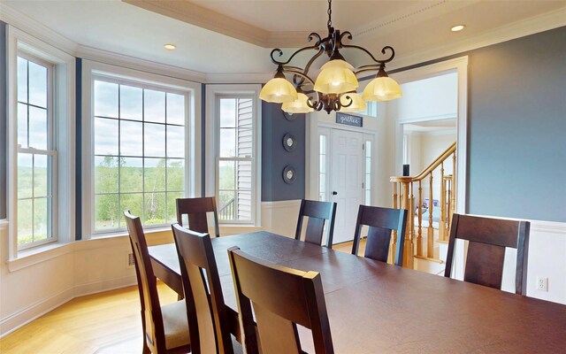 54 Fox Hill Run, Rock Tavern, NY 12575 - dining space with a chandelier, crown molding, light wood-style flooring, stairs, and recessed lighting
