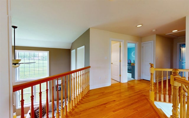 54 Fox Hill Run, Rock Tavern, NY 12575 - hall featuring an upstairs landing, light wood-style flooring, healthy amount of natural light, baseboards, and recessed lighting