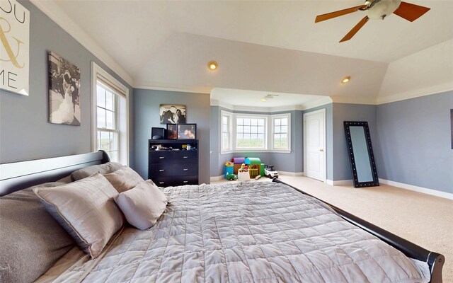 54 Fox Hill Run, Rock Tavern, NY 12575 - bedroom featuring carpet flooring, multiple windows, baseboards, lofted ceiling, and ceiling fan