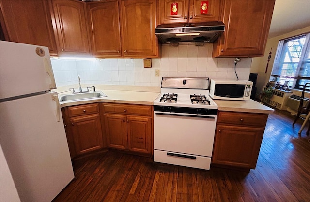13705 Franklin Ave Unit 3J, Flushing, NY 11355 - kitchen with a sink, white appliances, light countertops, dark wood-type flooring, and under cabinet range hood