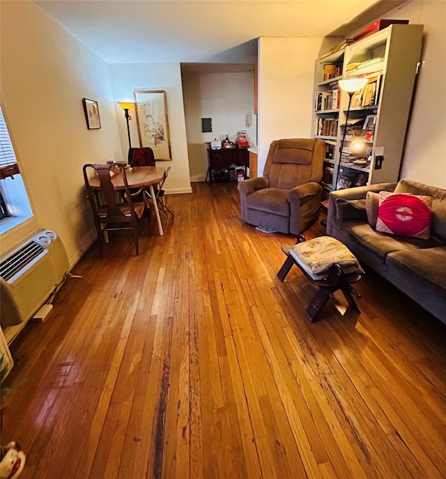 13705 Franklin Ave Unit 3J, Flushing, NY 11355 - living room featuring a wall mounted AC and hardwood / wood-style floors
