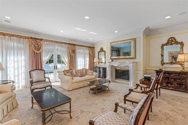 167 Brookville Rd, Brookville, NY 11545 - carpeted living area featuring crown molding, a glass covered fireplace, and a decorative wall